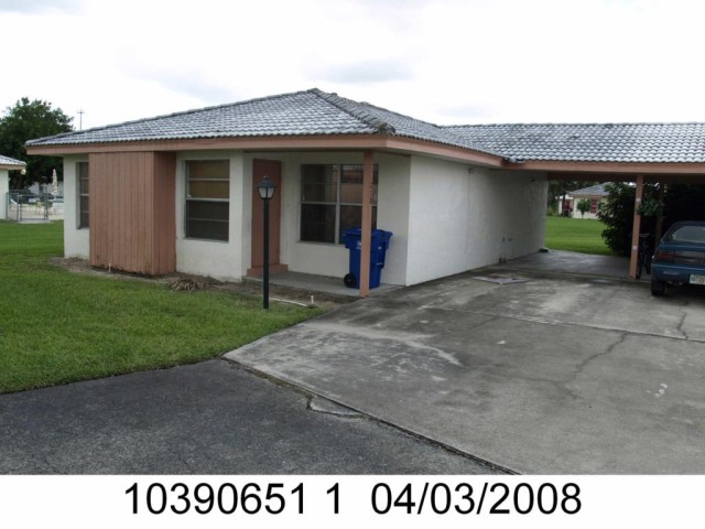 2-bed single family at 218 OAKMONT PKWY, Lee County FL — foreclosure auction