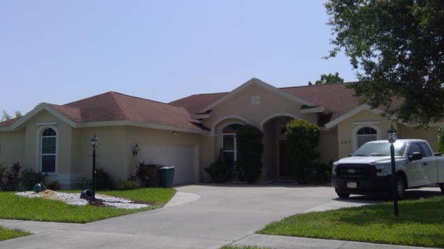 3-bed single family at 567 CHAMONIX AVE S, Lehigh Acres FL — foreclosure auction