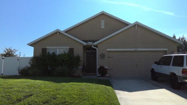 4-bed single family at 1217 NW 25TH AVE, Lee County FL — foreclosure auction