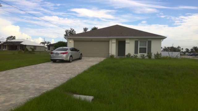 3-bed single family at 1125 NE 36TH ST, Lee County FL — foreclosure auction