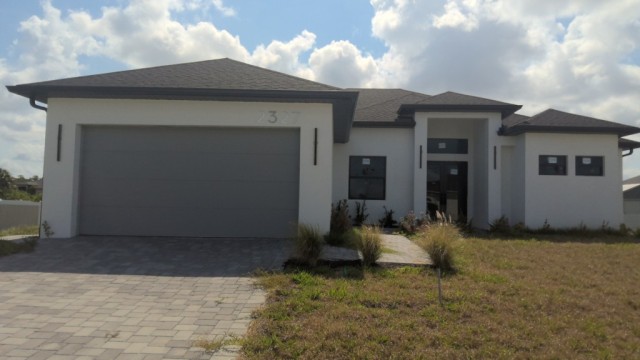 4-bed single family at 2327 NW 37TH AVE, Lee County FL — foreclosure auction