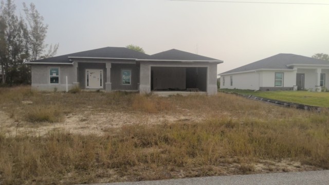 Vacant land at 3931 NE 12TH AVE, Lee County FL — foreclosure auction